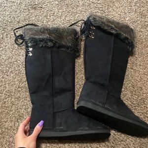 tall black boot. Only worn twice